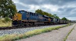 CSX 3203 is east with empty coal cars.